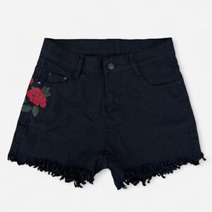 Black denim shorts with embroidered rose and distressed fringe hem
